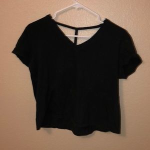 A black crop top with open back